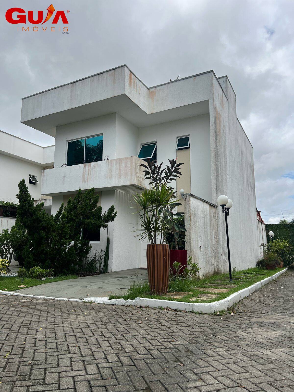 Casa de Condomínio à venda com 4 quartos, 150m² - Foto 2